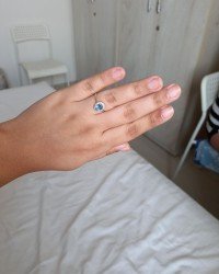 Happy Customer with Blue Topaz Ring