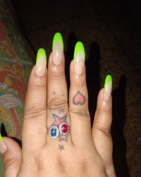 Happy Customer with Blue Topaz and Red Garnet Ring